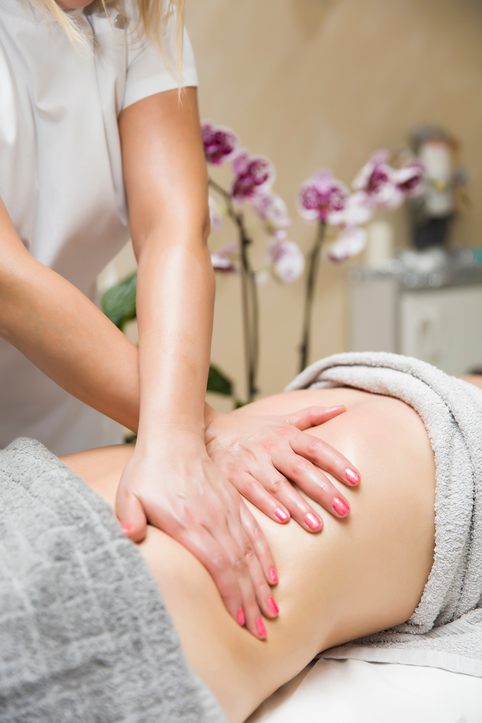 Woman Having an Professional Massage of the Abdomen